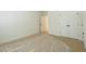 Bright bedroom with natural light, a double-door closet, and neutral carpet at 8633 Connor Ct, North Charleston, SC 29406