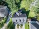 Aerial shot of the property, showcasing its landscaping, patio, and location within the community at 8657 Refuge Point Circle Cir, Charleston, SC 29420