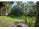 Beautiful backyard, well manicured with many large trees providing lots of shade and a gazebo at 8657 Refuge Point Circle Cir, Charleston, SC 29420