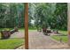 Inviting brick patio with a fire pit and comfortable seating, creating a perfect outdoor living space at 8657 Refuge Point Circle Cir, Charleston, SC 29420