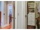 Walk-in closet features custom shelving and plenty of room for storage at 8657 Refuge Point Circle Cir, Charleston, SC 29420
