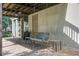 Covered patio features a swing, stone pavers and backyard access at 8657 Refuge Point Circle Cir, Charleston, SC 29420