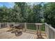 Spacious wood deck with views of the lush backyard and surrounding landscape at 8657 Refuge Point Circle Cir, Charleston, SC 29420