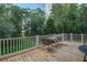 Wooden deck with cozy seating, ideal for enjoying the serene backyard views at 8657 Refuge Point Circle Cir, Charleston, SC 29420