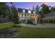 Charming two-story home with a spacious driveway, lush lawn and inviting front porch at 8657 Refuge Point Circle Cir, Charleston, SC 29420