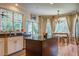 Bright kitchen features granite countertops, island, stainless steel appliances, and natural light at 8657 Refuge Point Circle Cir, Charleston, SC 29420
