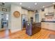 Spacious kitchen with stainless appliances, kitchen island, and breakfast bar at 8657 Refuge Point Circle Cir, Charleston, SC 29420