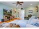 Bright living room with hardwood floors, neutral furnishings, and a view to the second story at 8657 Refuge Point Circle Cir, Charleston, SC 29420