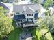 Gorgeous home featuring an outdoor deck with fire pit and spacious screened-in patio at 8657 Refuge Point Circle Cir, Charleston, SC 29420
