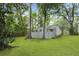 Charming backyard with mature trees at 987 Harbor Oaks Dr, Charleston, SC 29412
