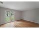 Inviting bedroom with natural light and polished hardwood floors at 987 Harbor Oaks Dr, Charleston, SC 29412