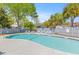 Inviting outdoor pool with lounge chairs and lush landscaping at 987 Harbor Oaks Dr, Charleston, SC 29412
