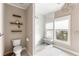 Stylish bathroom featuring a glass shower, modern toilet, and natural light at 103 Tall Oak Ave, Charleston, SC 29407