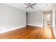 Expansive bedroom with hardwood flooring, natural light, and an ensuite bathroom at 103 Tall Oak Ave, Charleston, SC 29407