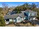 Charming two-story home with a two car garage, lovely porch, and light blue exterior at 103 Tall Oak Ave, Charleston, SC 29407