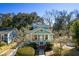 Beautiful home with lush landscaping and a well-maintained lawn, offering a welcoming view at 103 Tall Oak Ave, Charleston, SC 29407
