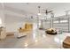 Spacious and bright garage, boasting ample storage and multiple ceiling fans at 103 Tall Oak Ave, Charleston, SC 29407