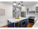 Modern kitchen with a center island featuring a wine cooler and microwave, stainless appliances at 103 Tall Oak Ave, Charleston, SC 29407