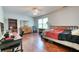 Bright bedroom with a computer desk, dresser and hardwood floors at 106 Trimley Ct, Goose Creek, SC 29445