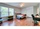 Bedroom featuring hardwood floors, two windows and a closet at 106 Trimley Ct, Goose Creek, SC 29445