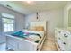 Bright bedroom with neutral walls, and wood floors, creating a relaxing retreat at 106 Trimley Ct, Goose Creek, SC 29445