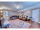 Spacious living room with a decorative rug and two brown leather sofas at 106 Trimley Ct, Goose Creek, SC 29445