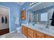 Bright main bathroom featuring a double vanity, and a walk-in shower, offering a spa-like experience at 106 Trimley Ct, Goose Creek, SC 29445