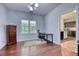 Bright office space with hardwood floors, natural light, and a view of the backyard at 106 Trimley Ct, Goose Creek, SC 29445