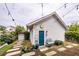 Backyard featuring a detached building with a blue door and a decorative sun accent at 107 Clear Bend Ln, Summerville, SC 29486