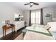 Bright bedroom featuring a ceiling fan, dresser, and ensuite furnishings at 107 Clear Bend Ln, Summerville, SC 29486