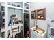 Walk-in closet featuring vanity, wall safe, and custom jewelry case at 107 Clear Bend Ln, Summerville, SC 29486