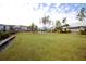 Large grassy common area featuring playground, lounge chairs, and clubhouse for community residents at 107 Clear Bend Ln, Summerville, SC 29486