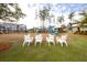 Common area with playground, lounge chairs, and clubhouse in a Primary-planned community at 107 Clear Bend Ln, Summerville, SC 29486