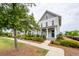 Inviting two-story home with a welcoming front porch and manicured landscaping at 107 Clear Bend Ln, Summerville, SC 29486