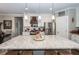 Spacious kitchen features a granite island and stainless steel appliances at 107 Clear Bend Ln, Summerville, SC 29486