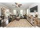 Comfortable living room with ample seating, a ceiling fan, and stylish decor at 107 Clear Bend Ln, Summerville, SC 29486