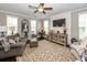Comfortable living room with ample seating, a ceiling fan, and stylish decor at 107 Clear Bend Ln, Summerville, SC 29486