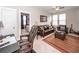 Comfortable living room featuring a leather sofa, ceiling fan and a doorway to another room at 107 Clear Bend Ln, Summerville, SC 29486