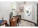 Home office with wooden desk, natural light, and access to an outdoor patio at 107 Clear Bend Ln, Summerville, SC 29486