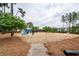 Community playground featuring slides, swings, and a wood chip safety surface at 107 Clear Bend Ln, Summerville, SC 29486