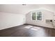 Spacious bedroom featuring wood floors, window with natural light, and air conditioning unit at 108 Old Dominion Dr, North Charleston, SC 29418