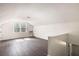 Large room with wood floors, large window, and an air conditioning unit at 108 Old Dominion Dr, North Charleston, SC 29418