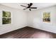 Well lit bedroom featuring hardwood floors, ceiling fan, and lots of natural light at 108 Old Dominion Dr, North Charleston, SC 29418
