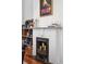View of white fireplace featuring unique decor and accessories to the left at 11 Franklin St, Charleston, SC 29401