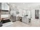 Spacious kitchen with a central island, stainless steel appliances, and a gas cooktop at 11 Franklin St, Charleston, SC 29401