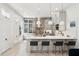 Contemporary kitchen with large island, pendant lighting, and stainless steel appliances at 11 Franklin St, Charleston, SC 29401