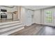 Basement area featuring a kitchenette, white appliances, and hardwood floors at 113 Harvey Ave, Goose Creek, SC 29445