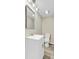 Well-lit bathroom featuring a modern vanity, new fixtures, and updated flooring at 113 Harvey Ave, Goose Creek, SC 29445