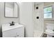 Bathroom showcasing updated finishes, a tiled shower, and modern fixtures at 113 Harvey Ave, Goose Creek, SC 29445