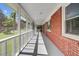 Brick home featuring an inviting screened in porch and plenty of natural light at 113 Harvey Ave, Goose Creek, SC 29445